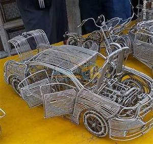 ساخت خودرو و موتورسیکلت تزئینی با سیم مسی/عکس