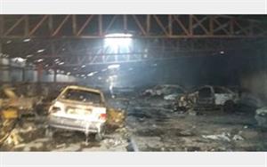 34 خودرو در آتش سوزی کارگاه صافکاری گناوه از بین رفت